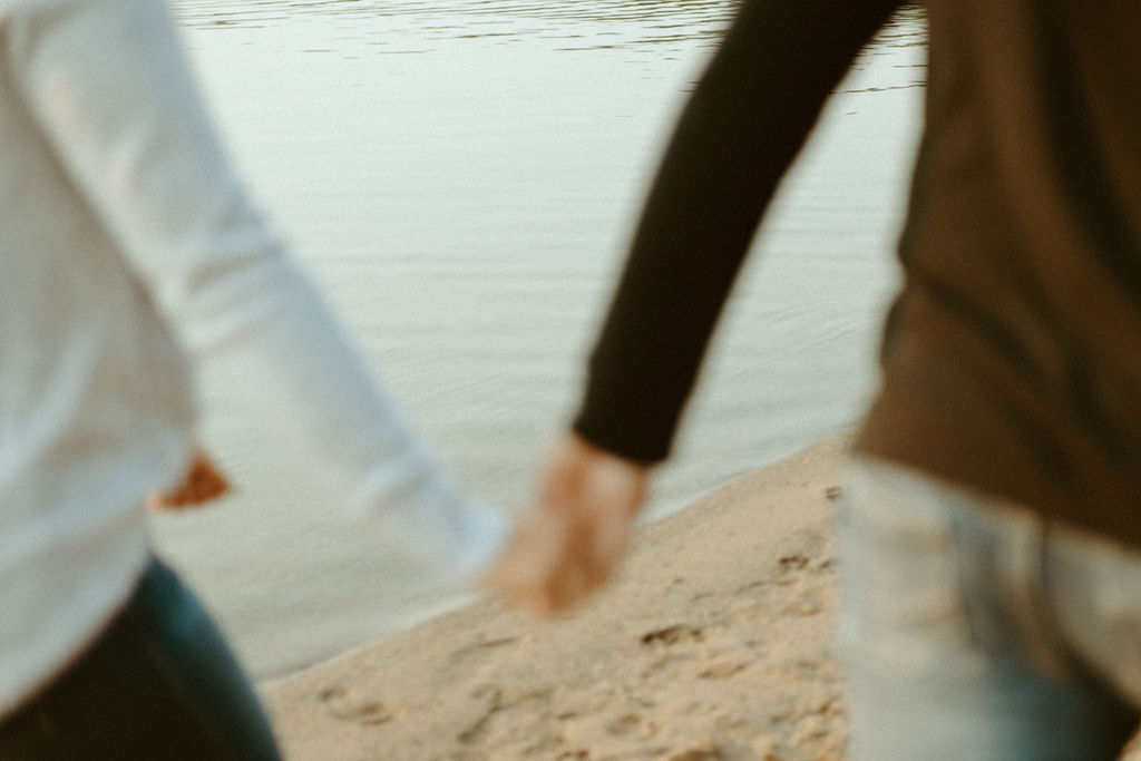 Stillwater, Minnesota Engagement Photos with Couple on a Beach