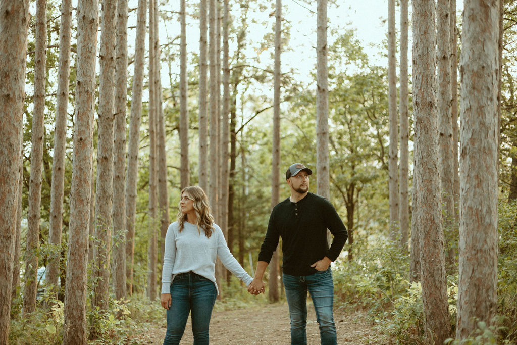 Stillwater, Minnesota Engagement Photos with Couple in Tall Pines