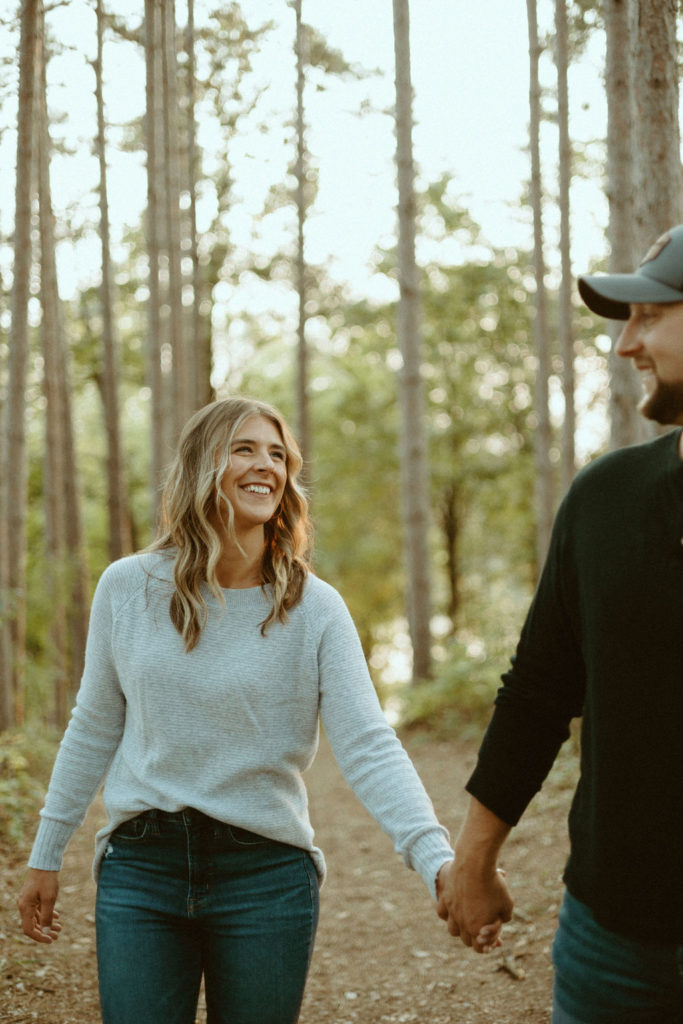 Stillwater, Minnesota Engagement Photos with Couple in Tall Pines