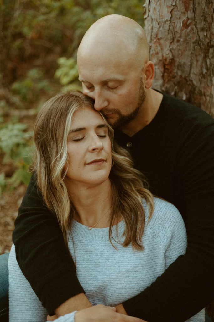 Stillwater, Minnesota Engagement Photos with Couple in Tall Pine Trees